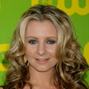 Beverley Mitchell exposed her cleavage in a black dress